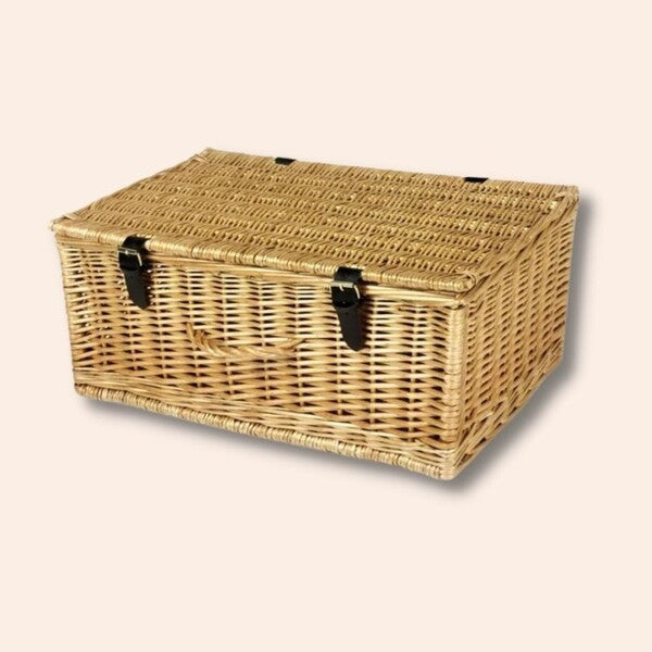 20-inch Wicker Hamper: Natural woven wicker with leather buckle straps.