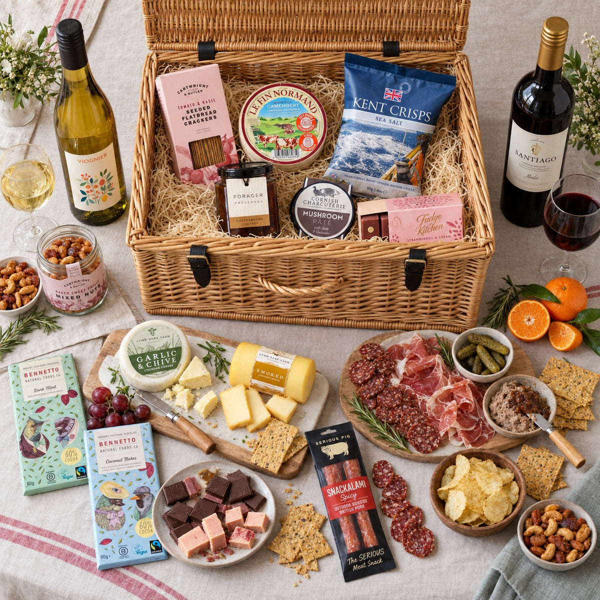 The Banquet Hamper: everything in the hamper laid out as a feast around the wicker basket